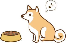 おすわりする犬